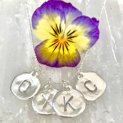 INITIAL CHARMS